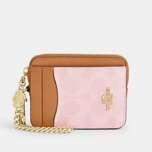 COACH Zip Card Case In Signature Canvas With Charm powder pink collection